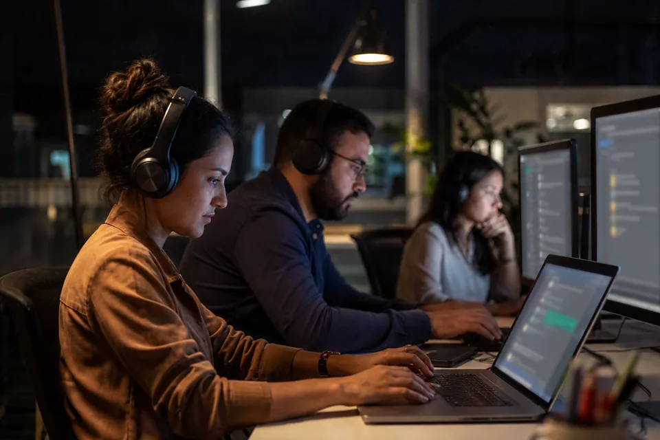 Remote chat team working laptops at night
