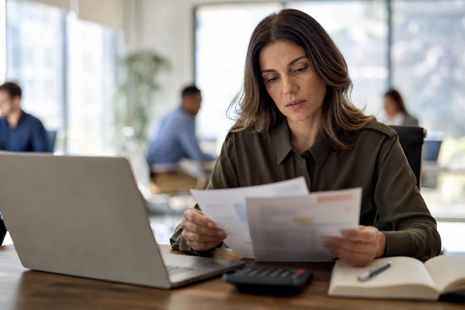 Performer reviewing a payment statement